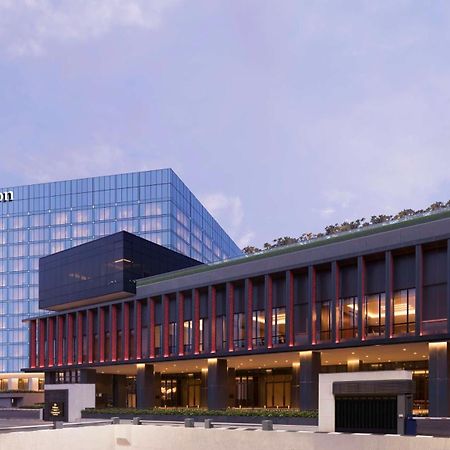 Отель Hilton Bengaluru Embassy Manyata Business Park Экстерьер фото
