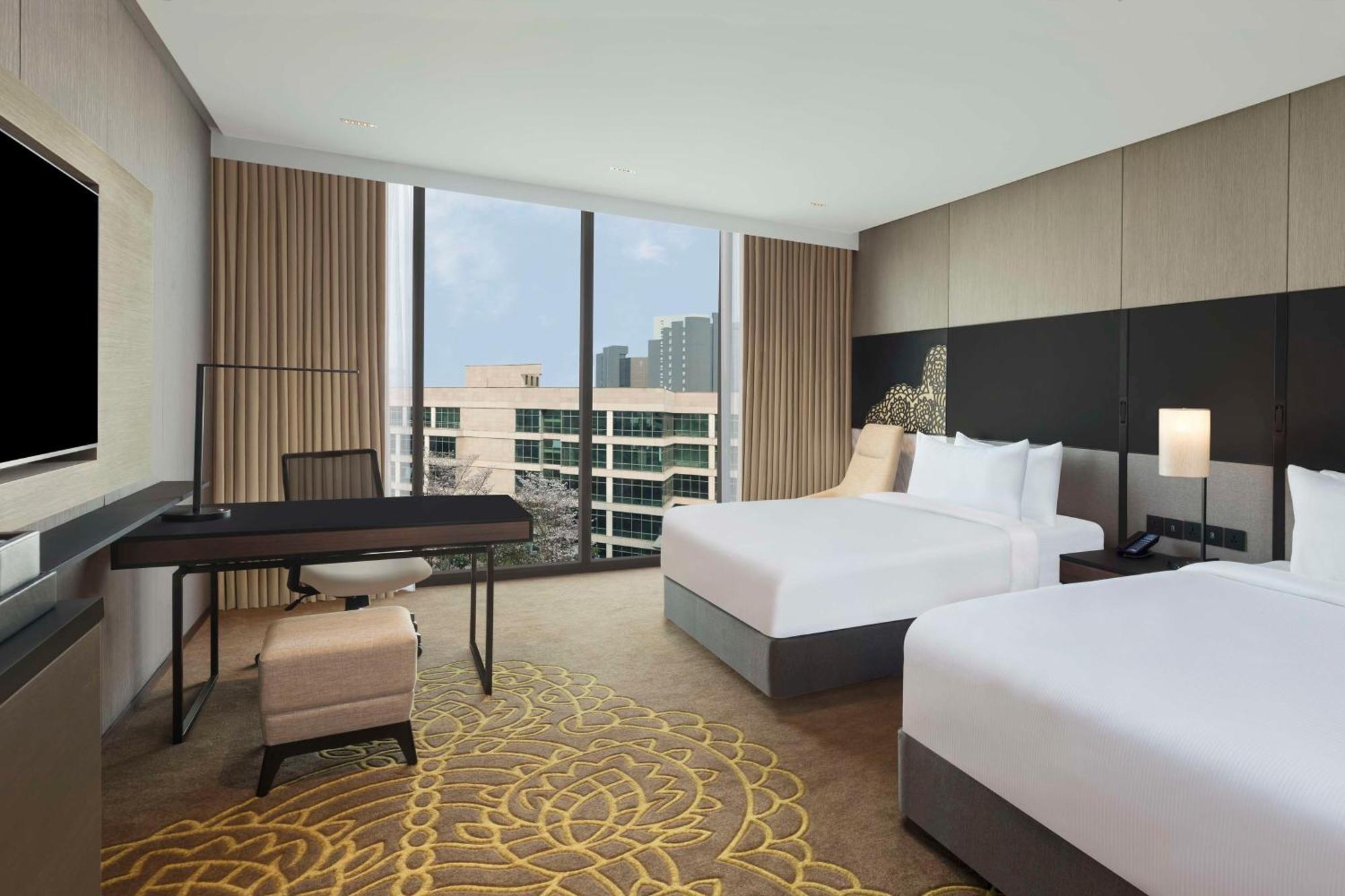 Отель Hilton Bengaluru Embassy Manyata Business Park Экстерьер фото